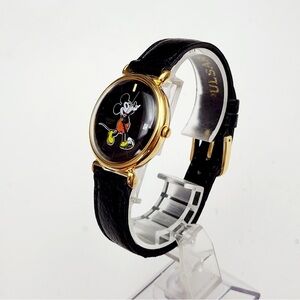 Vintage Pulsar Mickey Mouse watch, V537-8A30 model with a black dial.